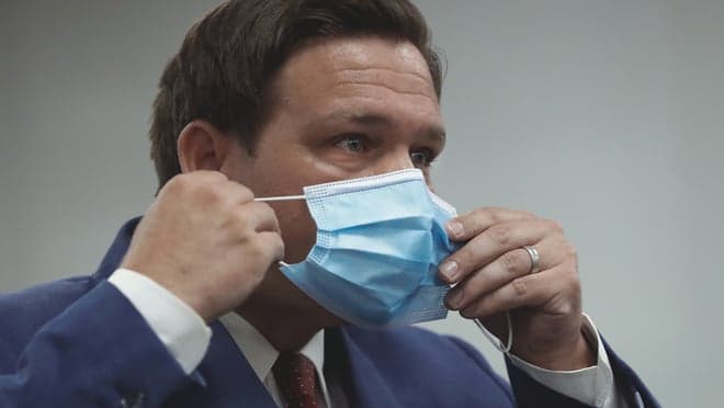 Florida is suffering a surge in COVID hospitalizations, breaking pre-vaccine records. In his pandemic timeline, Republican Governor Ron DeSantis has alternately declared victory, vilified Dr. Fauci and rejected masks. As he boasted in June, “We were the leading state fighting against coronavirus lockdowns.”