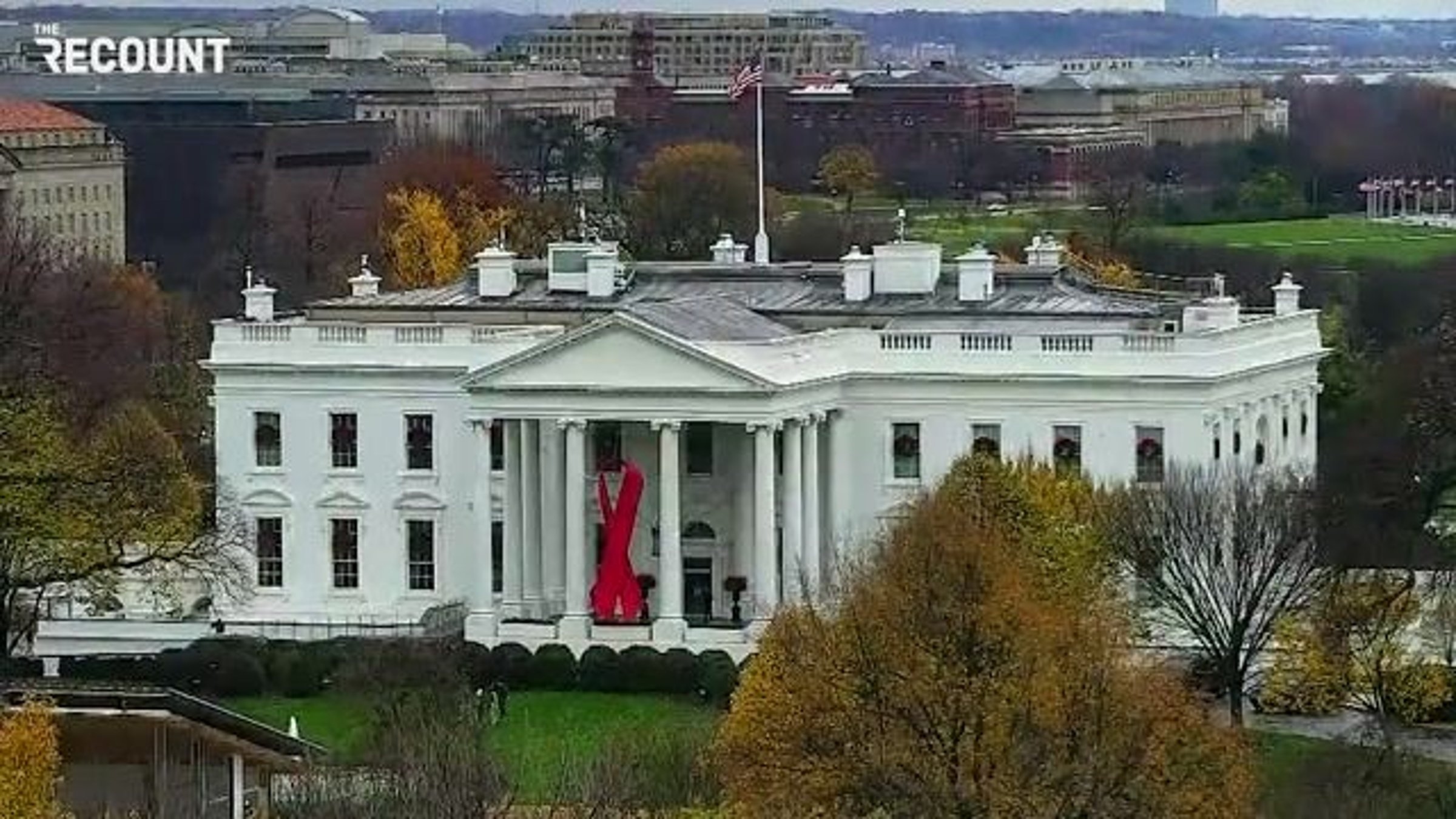 White House hangs red ribbon for World AIDS Day - CBS News